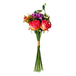 Close-up detail of a handmade artificial rose and camellia bouquet for home decor
