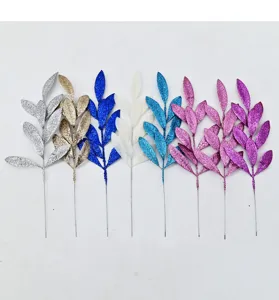 Collection of artificial glitter leaves in multiple colors for Christmas tree decoration
