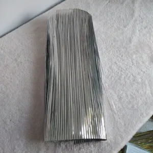 Macro view of shiny silver laser PVC fringe material for Christmas party decor