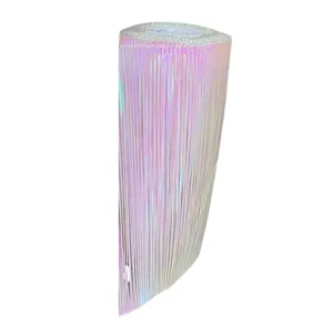 Close-up detail of iridescent laser PVC fringe material for party and holiday decorations.