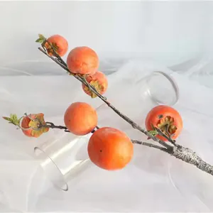 Lifelike artificial persimmon branch with realistic frosted orange fruits for home decor
