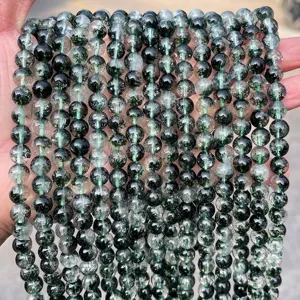 Macro view of natural green phantom quartz round beads strands for DIY jewelry making
