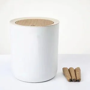 Detail view of Japanese round trash can with wooden lid and detachable legs