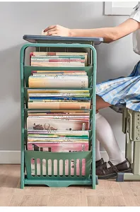 Green multi-layer student desk side book organizer storage rack in classroom setting