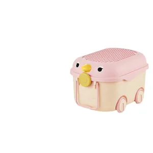 Duck-shaped kids toy storage box with building block lid and wheels for organization.