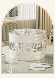 Elegant cream multi-layer snack storage box with butterfly lid in a home setting