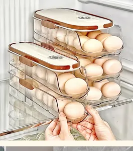 Close-up of a double-layer transparent rolling egg storage box in use inside a fridge