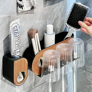 Wall-mounted bathroom organizer set with wood grain finish and three rinse cups