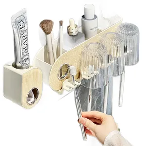 Modern cream wall-mounted toothbrush holder with 3 cups and automatic toothpaste dispenser