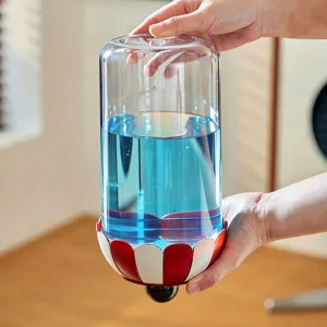 Large capacity transparent sealed grain storage jar with decorative red petal base