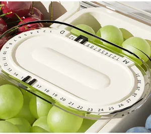 Primer plano del dial de fecha en un recipiente de plástico para frutas