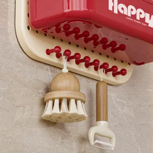 Modern red wall-mounted spice rack kitchen organizer with hanging hooks for utensils