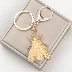 Eleganter goldener Bienen-Schlüsselanhänger mit glitzernden Strasssteinen Deko