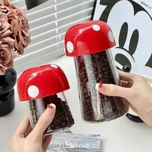 Mushroom-shaped airtight food storage jar with red polka dot lid for kitchen organization
