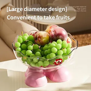 Corbeille à fruits créative avec dessus festonné transparent et base de chaussure rose