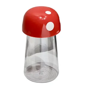 Red polka dot mushroom shaped airtight storage jar for kitchen food organization