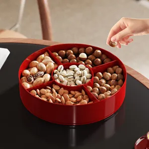 Elegant red multi-compartment nut snack tray for stylish living room storage and decor