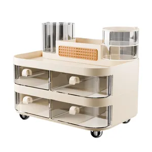 Large cream-colored multi-functional makeup organizer with four clear drawers and brush holders.