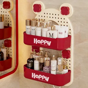 Two-tier wall-mounted pegboard storage rack with red bins for bathroom cosmetics organization