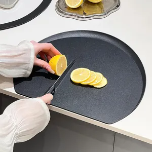 Black D-shaped non-slip TPU cutting board for modern home kitchen fruit slicing