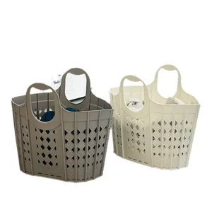 Cesti per biancheria in plastica resistenti con design a griglia e comodi manici