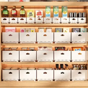 Extendable white plastic storage bins organized in a wooden kitchen pantry cupboard