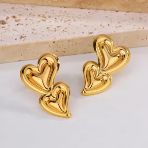 Boucles d'oreilles puces double cœur en acier titane doré style français femme
