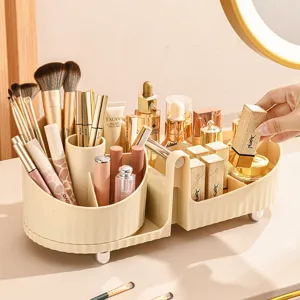 Rotating luxury makeup organizer for brushes and lipsticks on a vanity desktop setup.