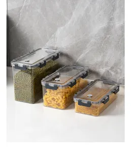 Set of three transparent plastic food storage containers with black airtight lids.