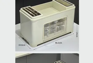 Dimensions of cream kitchen seasoning storage box with 6 jars and integrated knife rack.