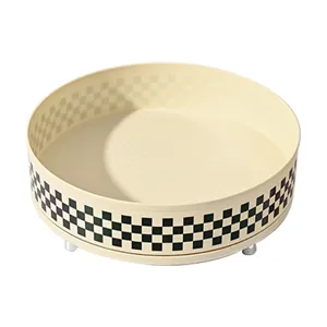 Rotating cream plastic storage tray with a classic black and white checkerboard pattern