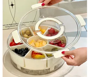 Detail showing the transparent lid and handles of a 6-compartment fruit storage container