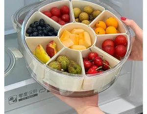 Multi-compartment transparent snack container used for fresh fruit storage in a fridge
