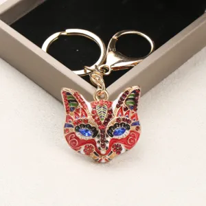 Vintage fox mask keychain with colorful rhinestones and enamel detailing bag charm