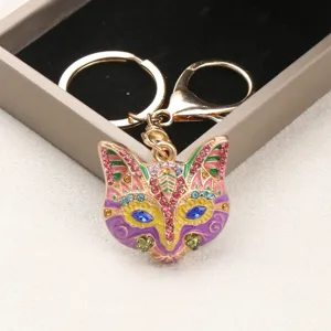 Vintage colorful fox mask keychain with sparkly rhinestones and enamel bag charm pendant