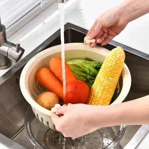Multi-functional rotating double-layer drain basket for washing fresh fruits and vegetables