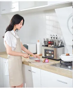 Multi-functional stainless steel kitchen organizer for spice jars and knives in use