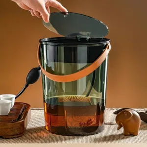 Draagbare transparante donkergroene theeafvalemmer met handvat en deksel voor thee-ceremonie