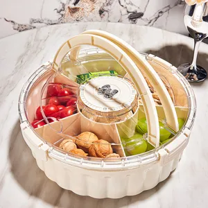 Elegant cream-colored divided snack container with transparent lid and handle for party nuts