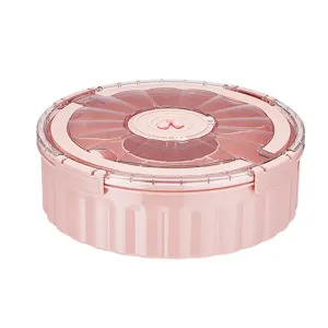 Pink circular snack storage box with partitioned compartments and date lid