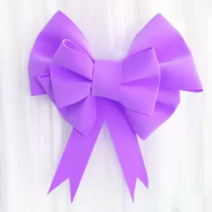 Giant purple bow decoration for Christmas tree, party, shop window, and holiday DIY crafts.