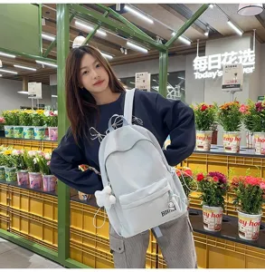 Stylischer hellblauer Schulrucksack für Schüler mit süßem Sternanhänger und großem Volumen