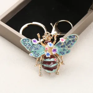 Vintage Bienen-Schlüsselanhänger mit funkelnden Strasssteinen und Blumen-Anhängern