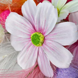 Artificial cosmos flower detail, pink white silk floral arrangement, macro close up view.