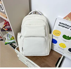 Detail shot of casual white travel backpack with large capacity and multi pockets.