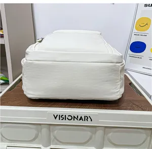 Simple large capacity men backpack in solid white color, ideal for daily school and travel.