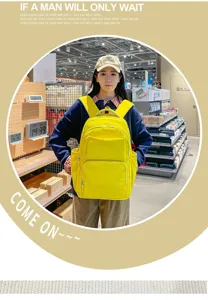 Yellow large capacity casual backpack for men and women, perfect for travel, commute and school use.