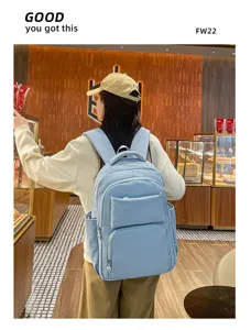 Casual light blue backpack for student daily commute and outdoor travel, spacious design.