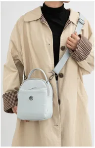 Bolso bandolera de nailon ligero para mujer informal color sólido mini bolso con múltiples bolsillos.