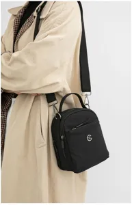 Bolso cruzado mini de tela oxford negra para mujer, bolso de hombro informal con múltiples bolsillos.